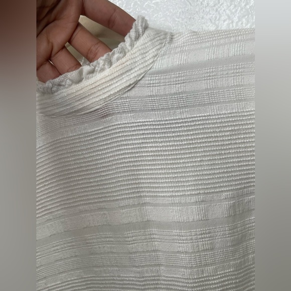 Reformation Cream Mock neck long sleeve blouse xxs
Purchased from The Real Real - Picture 9 of 14